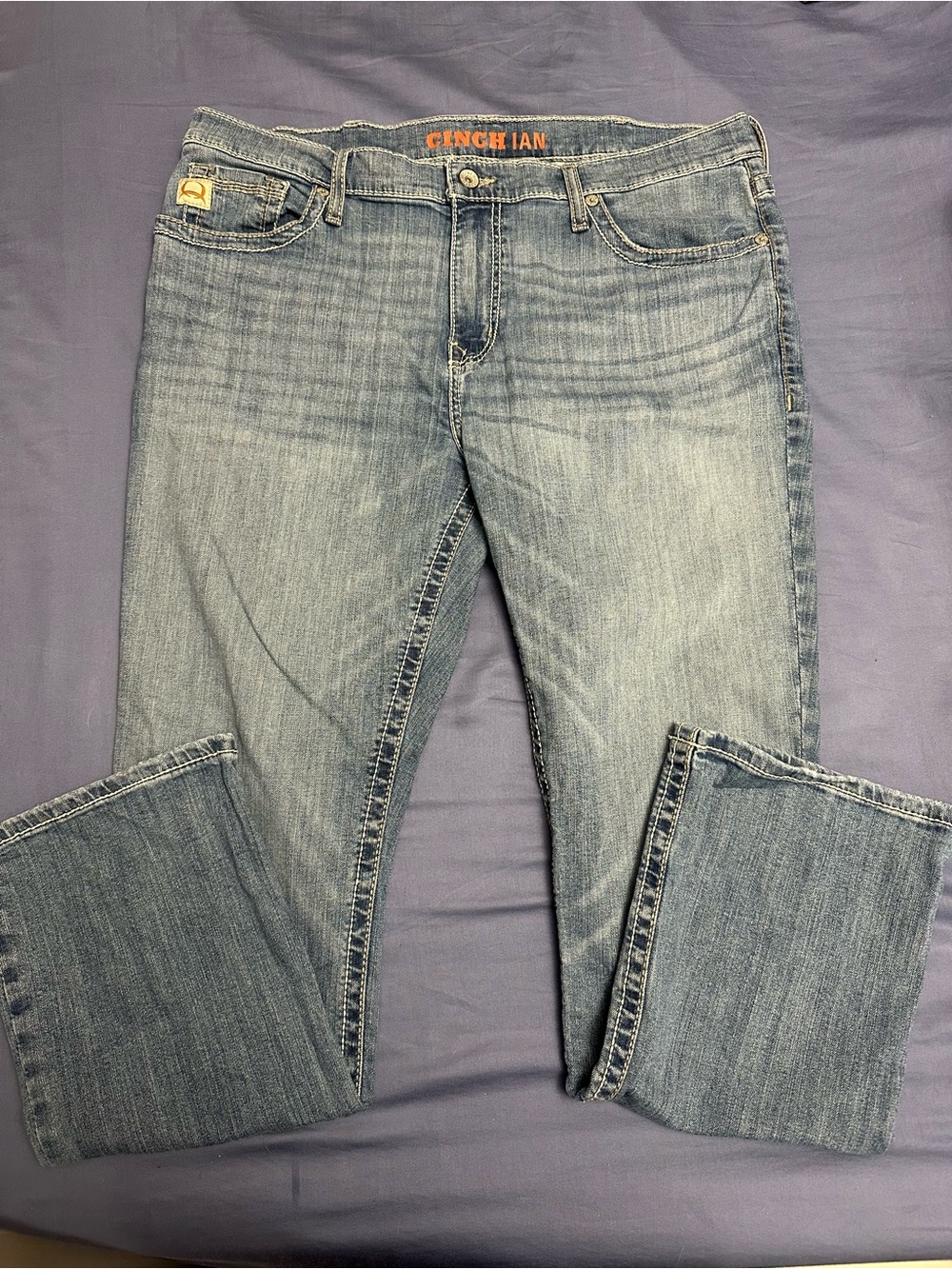 Cinch Light Blue Denim Jeans with Orange Logo